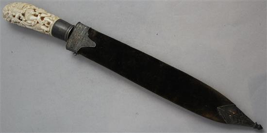 An early 20th century Indonesian ivory and silver mounted paperknife, 16.5in.